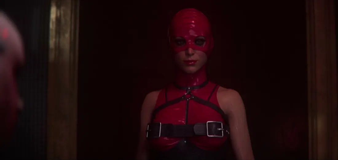 A red-masked Scarlet Church cultist faces the player in Hellraiser Revival